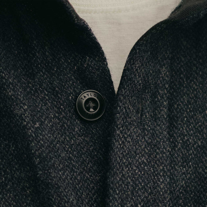 fit model showing off the buttons on The CPO Shirt in Marine Tweed Wool