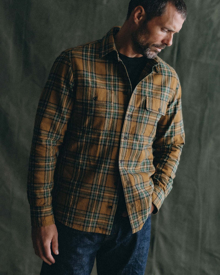 fit model posing in The Craftsman Shirt in Fern Plaid