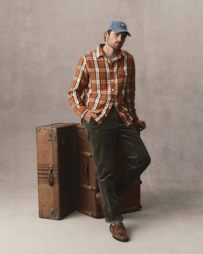 fit model posing in The Crater Shirt in Brick Plaid