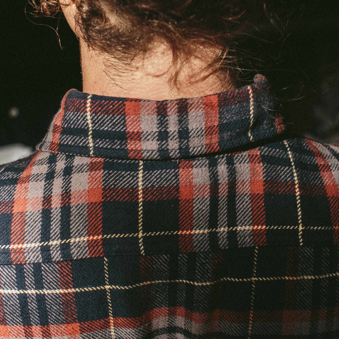 Fit model showing back collar of the Crater Shirt in Burgundy Plaid