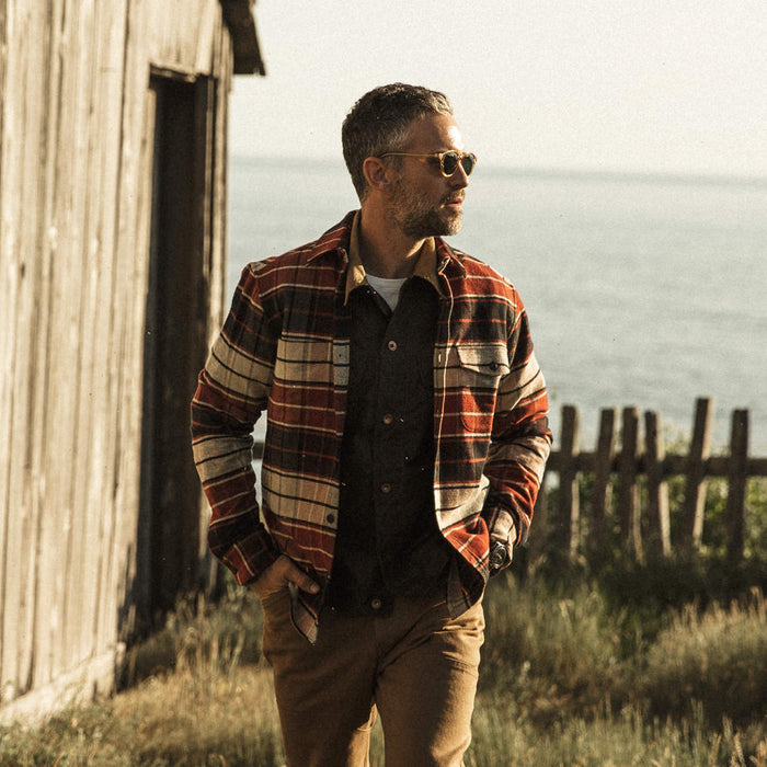 Our fit model wearing The Crater Shirt in Rust Plaid