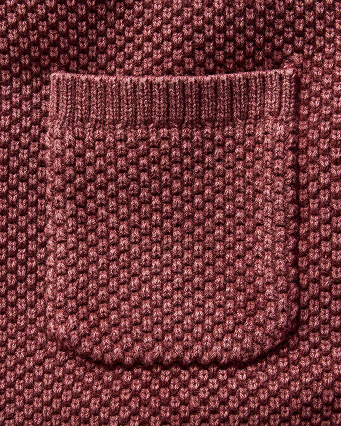material shot of the pocket on The Crawford Crew Sweater in Dried Cherry