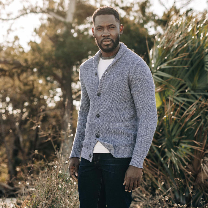 fit model posing in The Crawford Sweater in Blue Melange