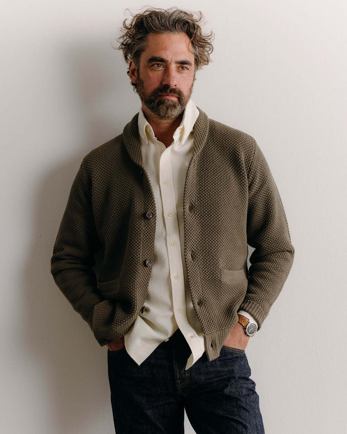 fit model posing wearing The Crawford Cardigan Sweater in Fatigue Olive