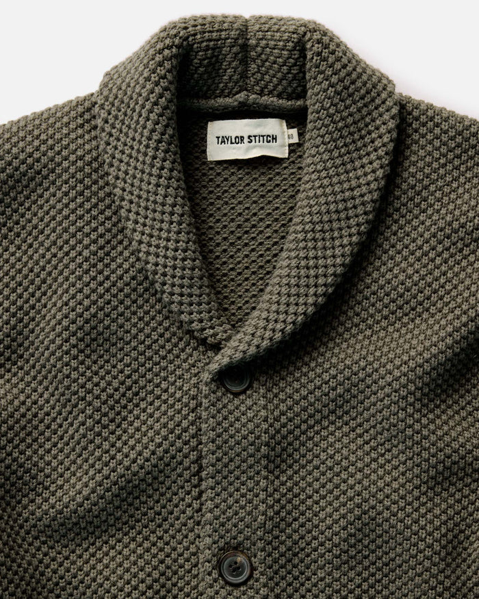 material shot of the pocket and cuff on The Crawford Sweater in Fatigue Olive