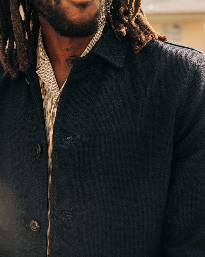 fit model showing off the buttons on The Crew Jacket in Raw Indigo Sashiko