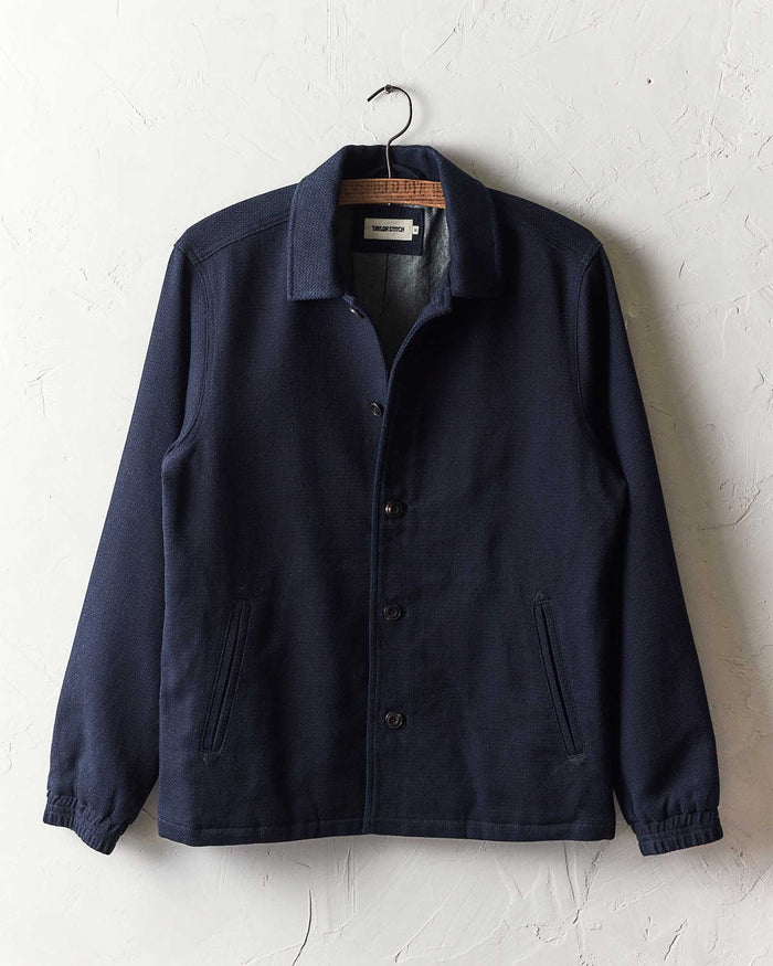 editorial image of The Crew Jacket in Raw Indigo Sashiko hanging