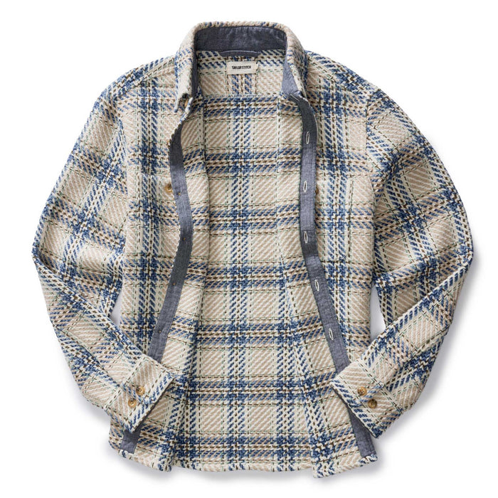 flatlay of the inside of The Cutter Overshirt in Sandbar Plaid