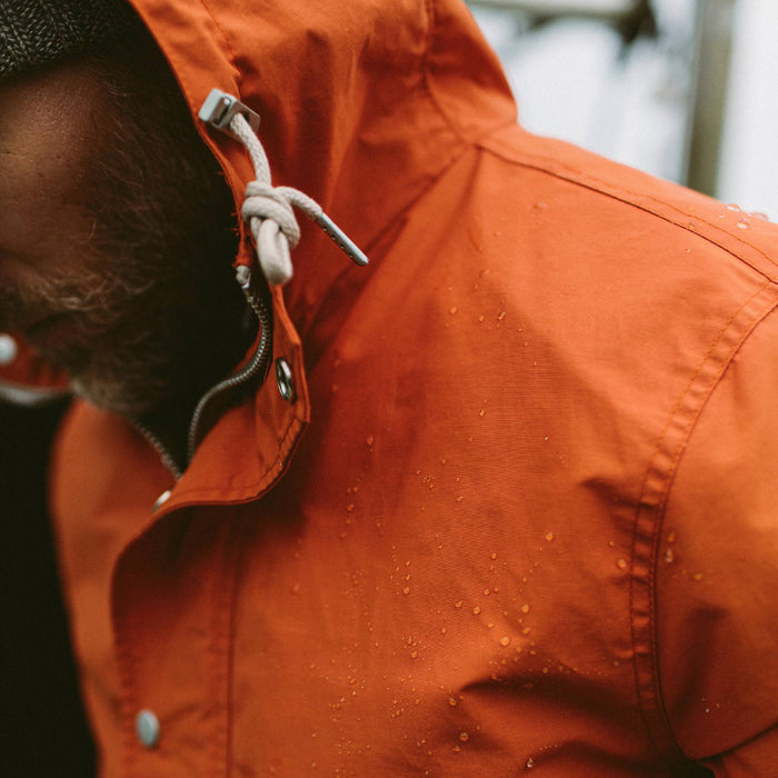 fit model with water droplets on The Dalton Jacket in Rust