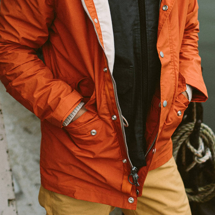 fit model with hands in pocket of The Dalton Jacket in Rust