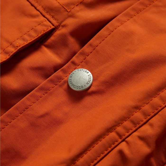material shot of front placket and button of The Dalton Jacket in Rust