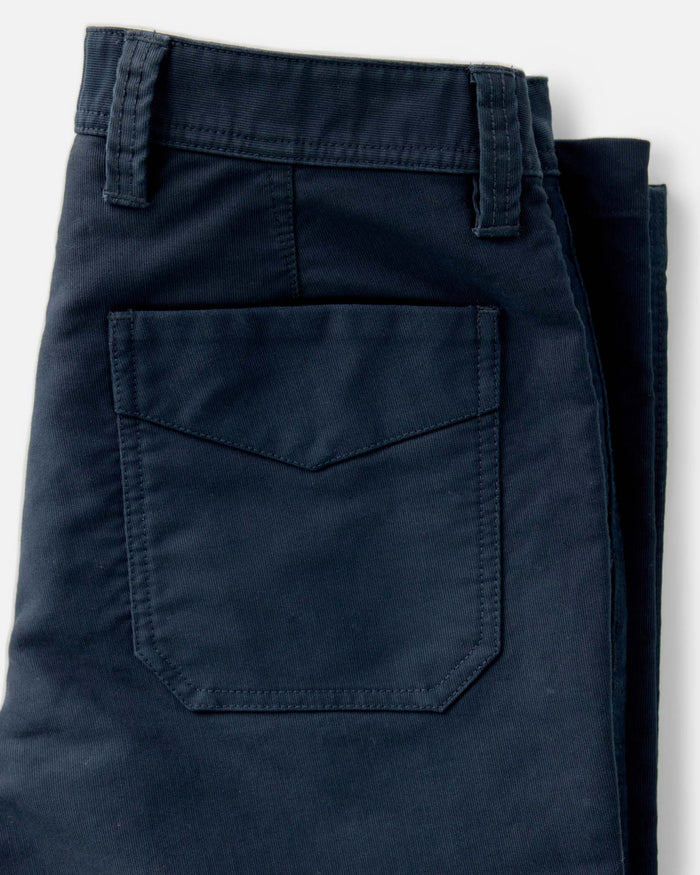 material shot of the back pocket on The Deck Pant in Dark Navy Bedford Cord
