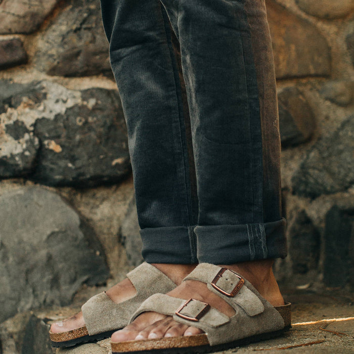 fit model wearing the all day pant, cuffed with birks