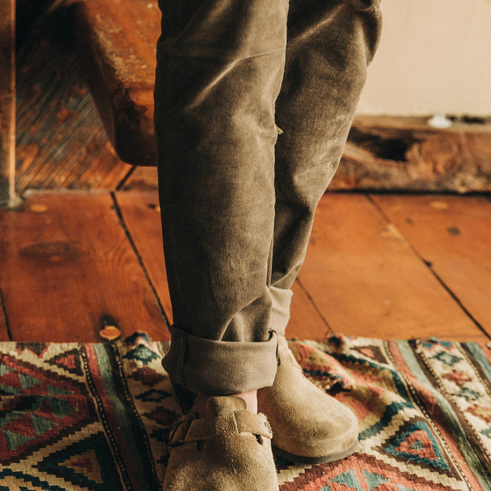 fit model wearing the all day pant, cuffed with birks