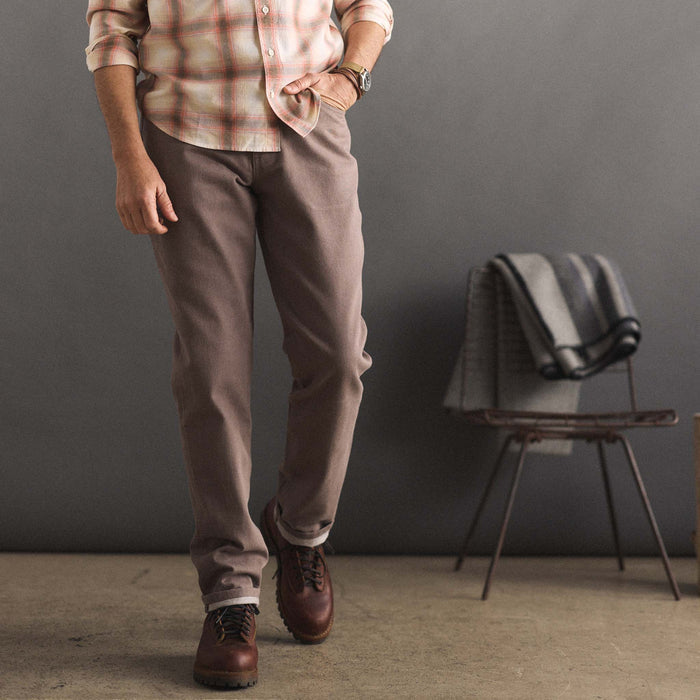 fit model sitting in The Democratic All Day Pant in Silt Broken Twill