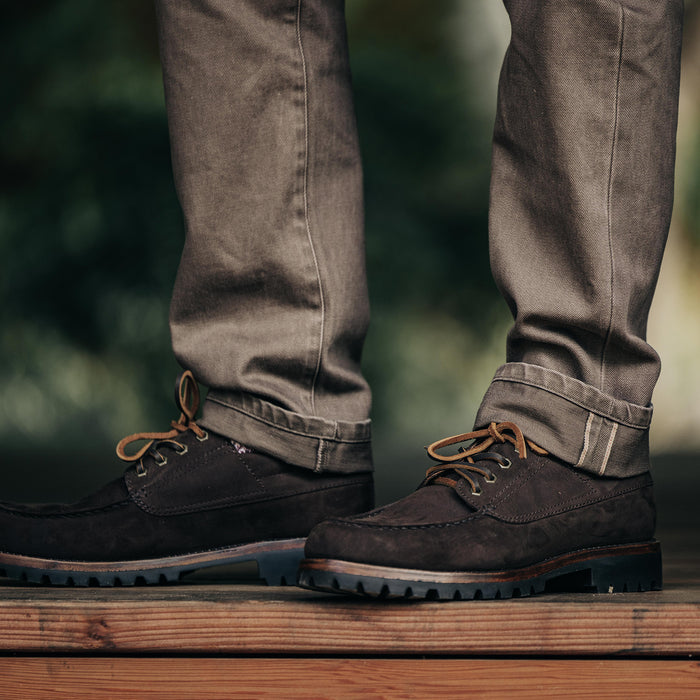 fit model showing the cuffs on The Democratic All Day Pant in Washed Walnut Selvage