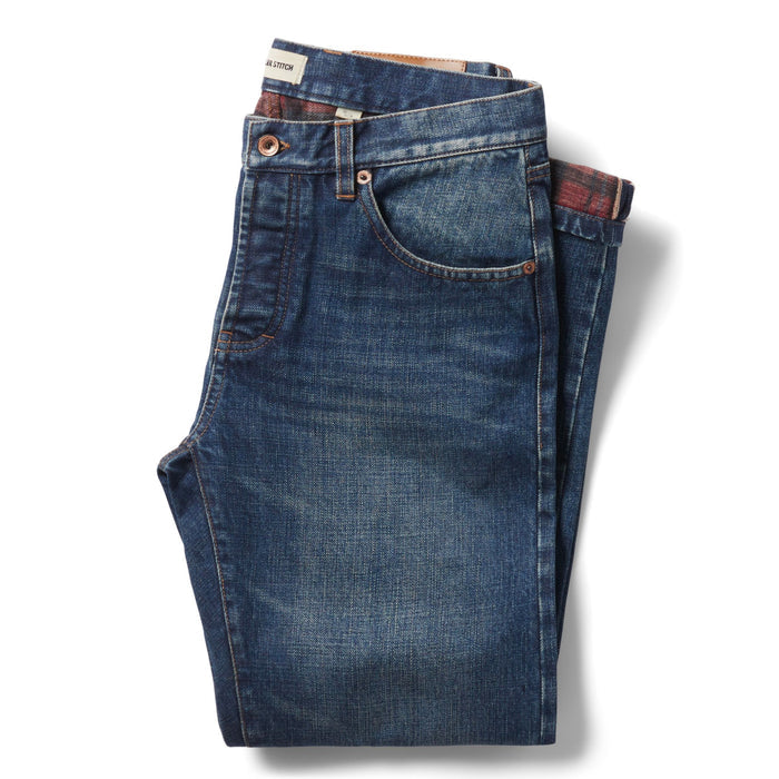 flatlay of The Democratic Brushed Back Jean in Sawyer Wash Organic Selvage folded