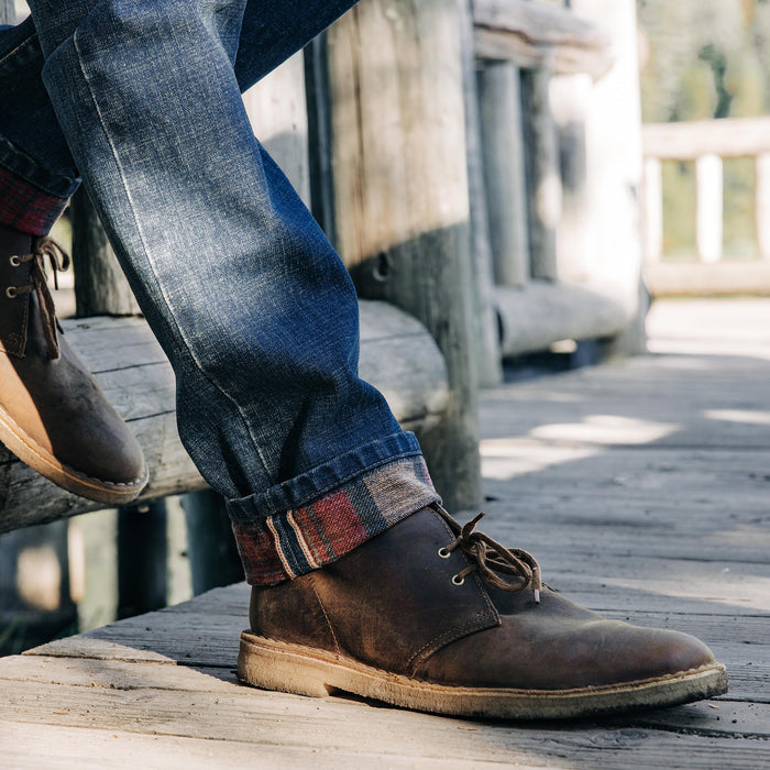 fit model showing off cuffs on The Democratic Brushed Back Jean in Sawyer Wash Organic Selvage