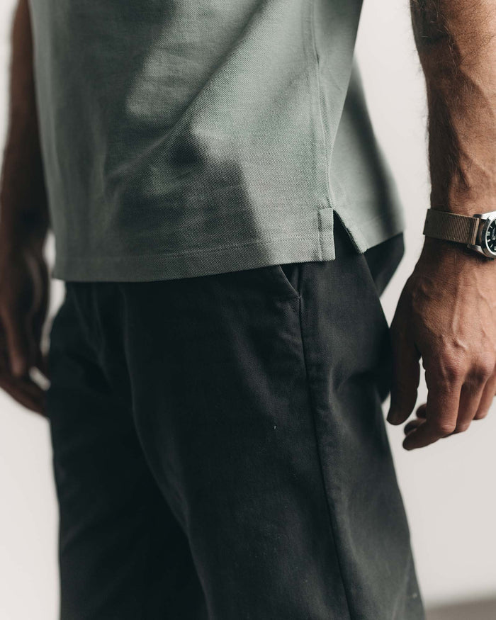 fit model showing off the back of The Democratic Foundation Pant in Organic Faded Black