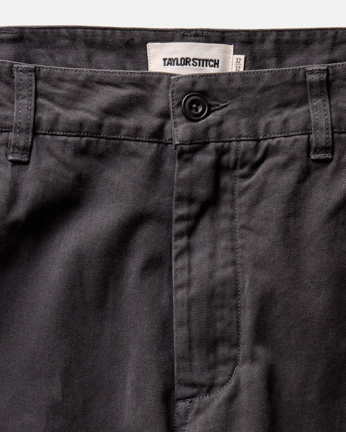 fit model posing in The Democratic Foundation Pant in Organic Faded Black