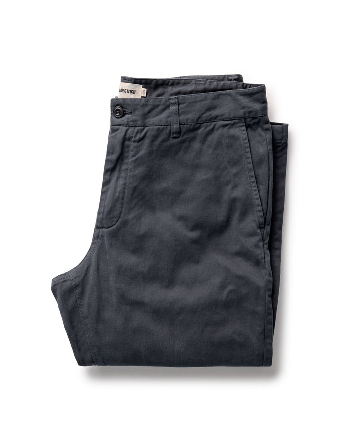 folded flatlay of The Democratic Foundation Pant in Organic Navy