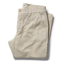 folded flatlay of The Democratic Foundation Pant in Organic Stone