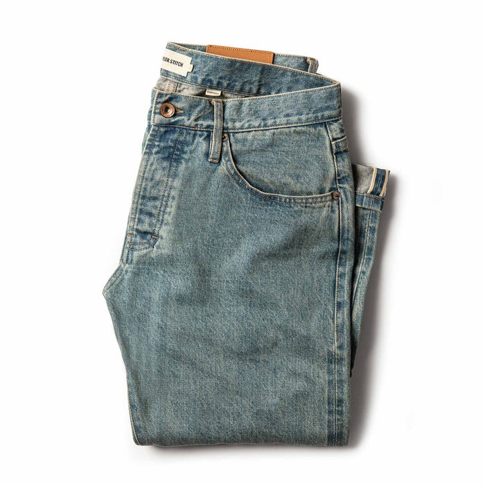 folded flatlay of jean front