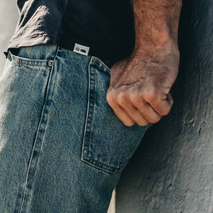 our fit model wearing The Democratic Jean in 24-Month Wash Japanese Selvage—back detail shot