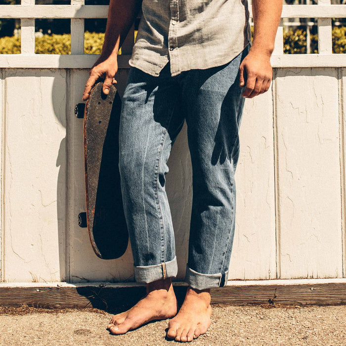 Our model showing the Democratic Fit of the 24 month wash denim