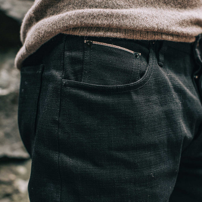 our fit model wearing The Democratic Jean in Black Selvage