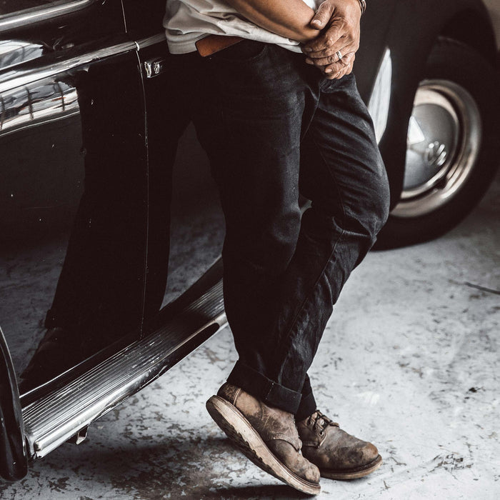 Our fit model wearing The Democratic Jean in Kuroki Mills Black Selvage