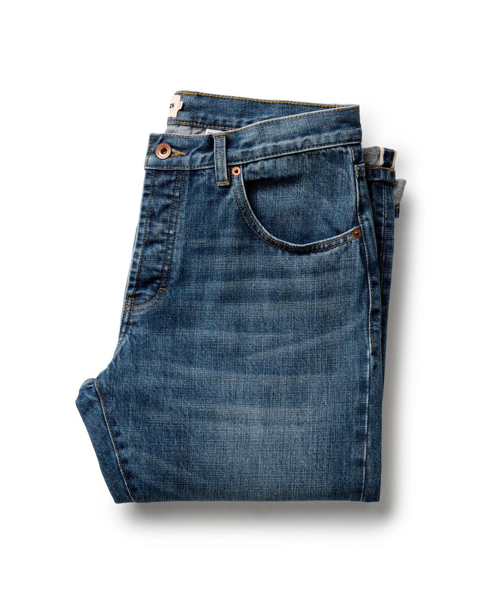 folded flatlay of The Democratic Jean in Mid Wash Organic Selvedge