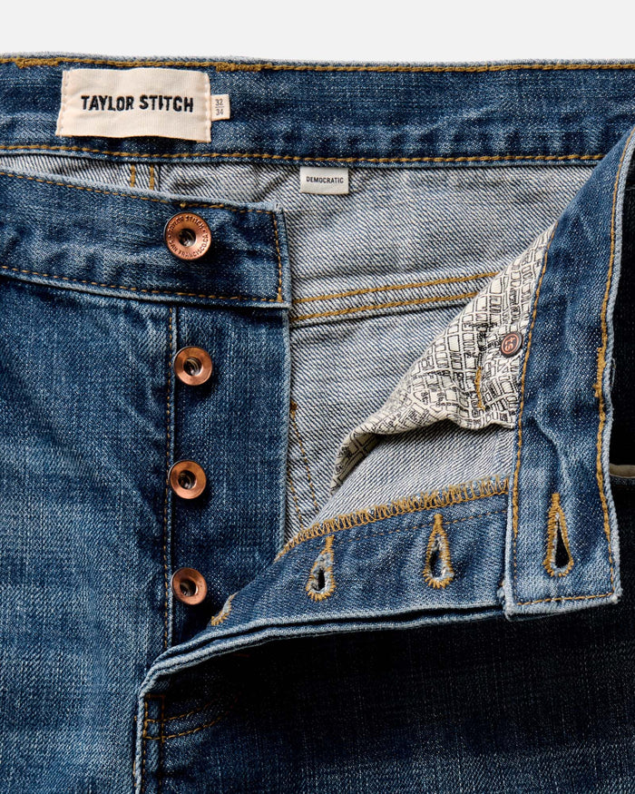 fit model showing off the back of The Democratic Jean in Mid Wash Organic Selvedge