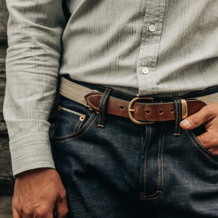fit model wearing The Democratic Jean in Organic Selvage, cropped waist shot