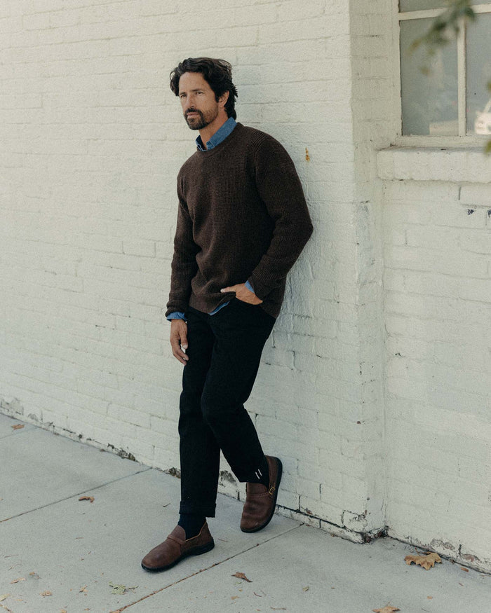 fit model showing off The Democratic Jean in Rigid Black Organic Selvedge