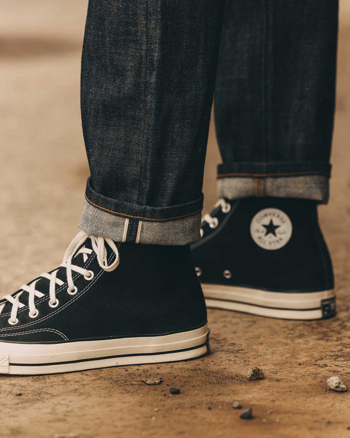 fit model showing off the selvedge cuff on The Democratic Jean in Rigi Organic Selvedge
