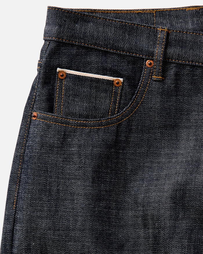 folded flatlay of the back of The Democratic Jean in Rigid Organic Selvedge