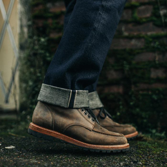 fit model showing cuffed selvage hem of The Democratic Jean in Rinsed Organic Selvage