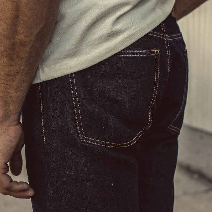 Our fit model wearing The Democratic Jean in Linen Denim.