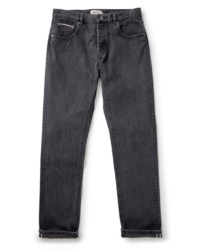 flatlay of The Democratic Jean in Washed Black Organic Slub Selvedge
