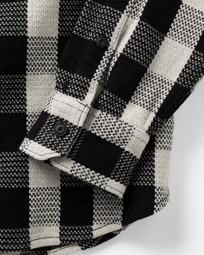 material shot of the cuff on The Division Shirt in Black Indigo Check