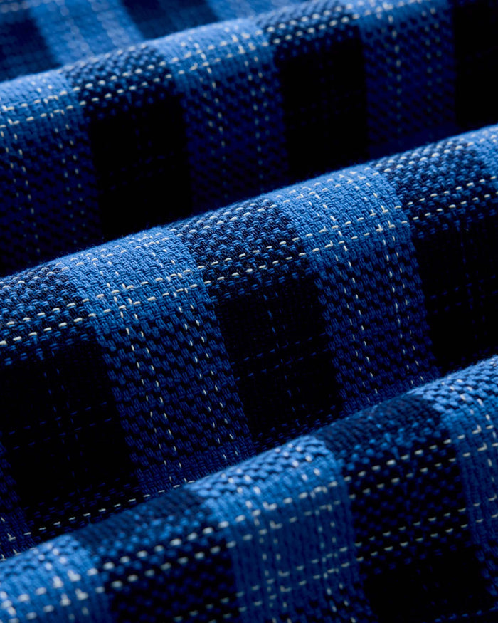 material shot of the fabric on The Division Shirt in Rinsed Indigo Plaid