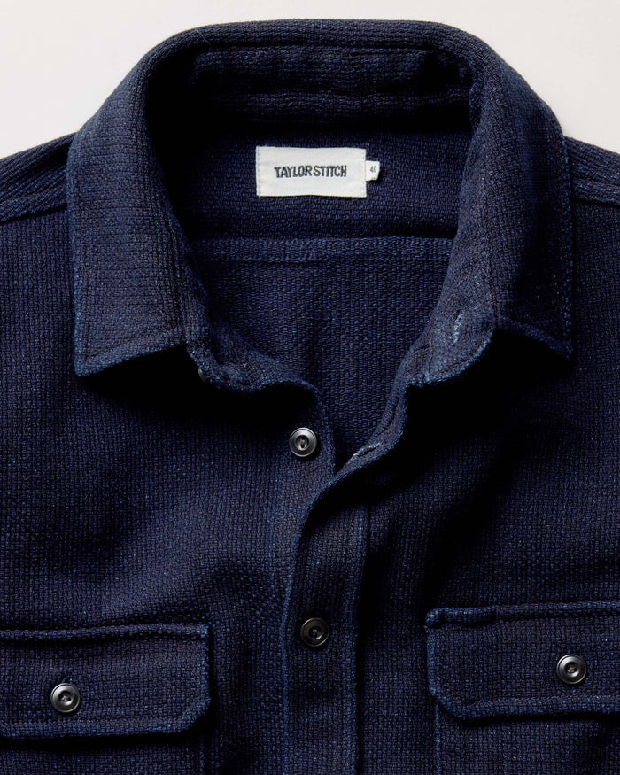 fit model showing off the back of The Division Shirt in Rinsed Indigo