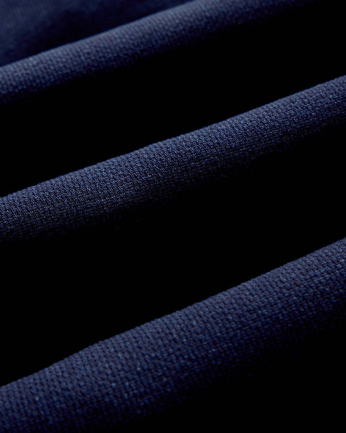 material shot of the pocket on The Division Shirt in Rinsed Indigo