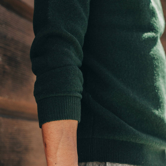 fit model wearing The Double Knit Sweater in Forest, sleeve detail
