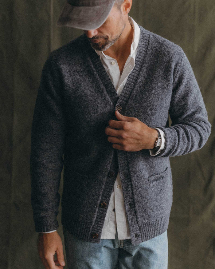 fit model posing in The Eastmoor Cardigan in Heather Graphite Wool
