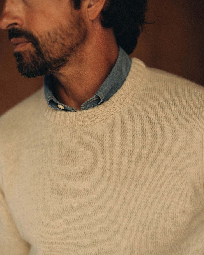 fit model showing off the collar on The Eastmoor Sweater in Heather Ivory Wool