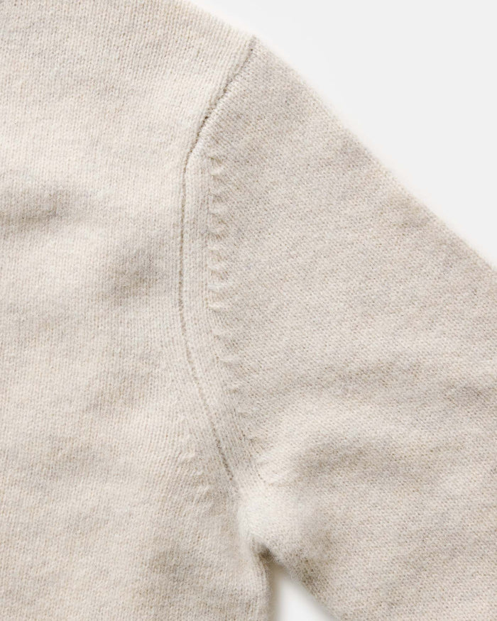 material shot of the shoulder on The Eastmoor Sweater in Heather Ivory Wool