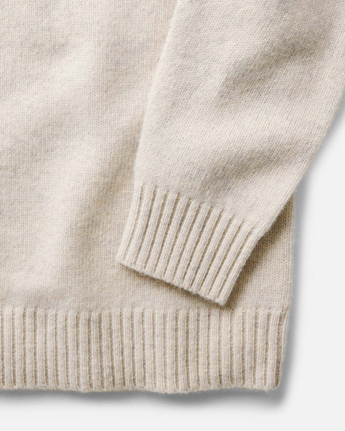 material shot of the sleeve on The Eastmoor Sweater in Heather Ivory Wool