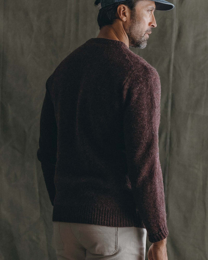 fit model showing off The Eastmoor Sweater in Heather Port Wool